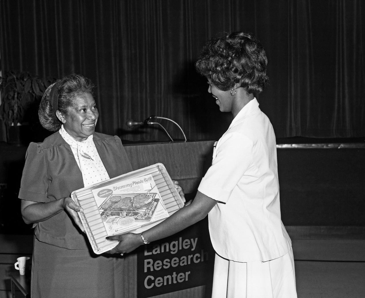 Federal Women's Program with Mary Jackson giving out awards. In 1958 Mary Jackson became NASA's first black female engineer.