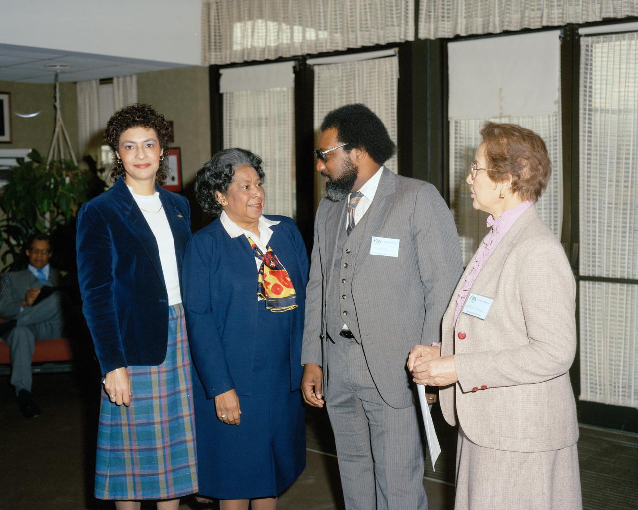 Photograph taken November 8,1984. Student Symposium Meeting Left to right Vivian Merritt, Office of Equal Opportunity Programs, Mary Jackson, Manger, Federal Woman’s Program, guest speaker Mr. James Jennings, and Katherine Johnson, Flight Dynamics and Control Division. Jennings’ career has included management and analyst positions at the Marshall Space Flight Center and NASA Headquarters. He is known for his ability to work with people and get things done. Jennings is a member of numerous professional and community organizations. He has served as Chairman of the KSC Combined Federal Campaign and Savings Bond Drive. Jennings has received numerous awards during his NASA career including an Equal Employment Opportunity Award in 1975, an Exceptional Service Medal in 1988, the Equal Employment Opportunity Medal in 1989, and an Outstanding Leadership Medal in 1994. Jennings also received the Distinguished Service Award in 1989 and the President's Award in 1999 from the Space Coast Chapter of the Federally Employed Women. He was conferred the rank of Meritorious Executive in 1997, and received the 1999 Presidential Distinguished Rank Award.