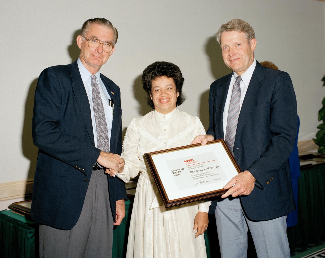 Technology Transfer Awards, Dr. Christine M. Darden, with Center Director Richard W. Peterson on the right. 