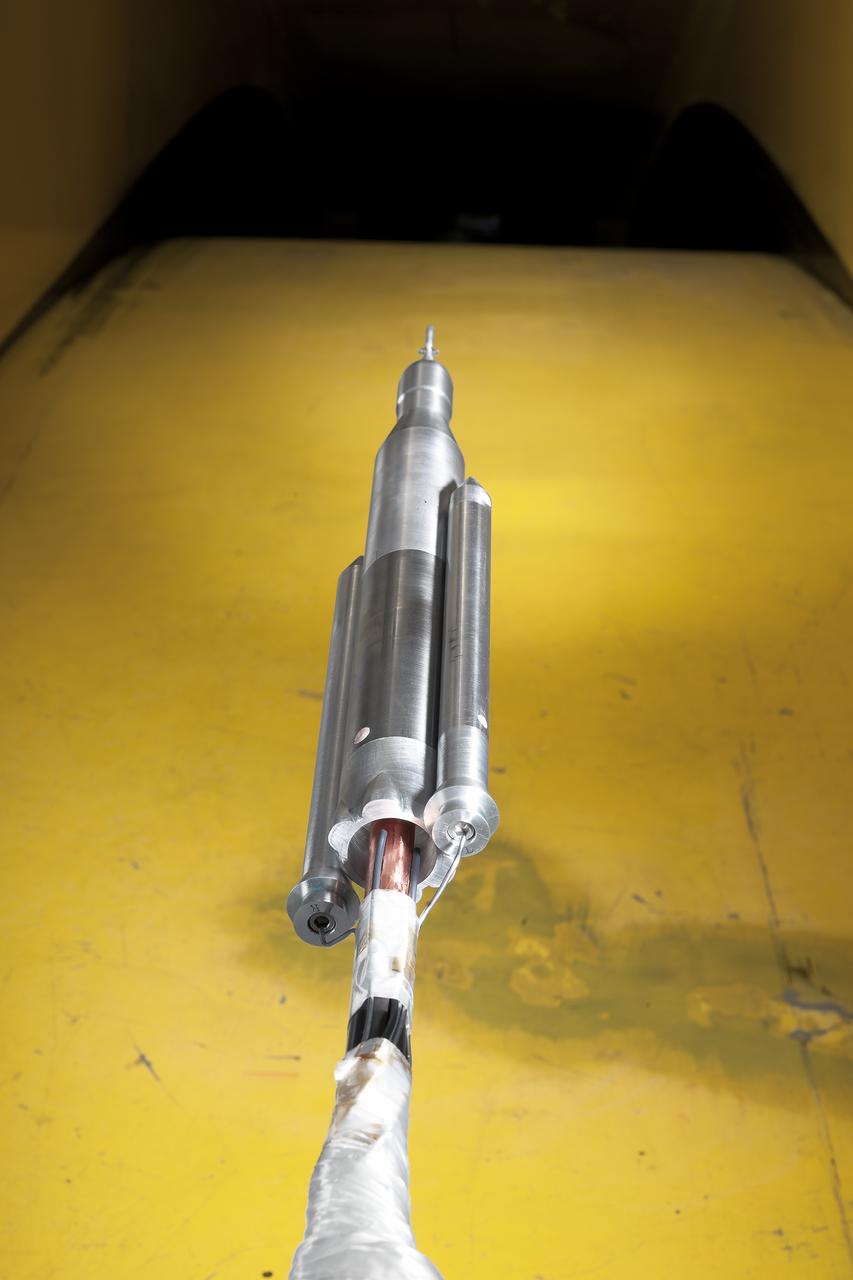 0.4 Percent Scale Space Launch System Wind Tunnel Test  0.4 Percent Scale SLS model installed in the NASA Langley Research Center Unitary Plan Wind Tunnel Test Section 1 for aerodynamic force and movement testing.