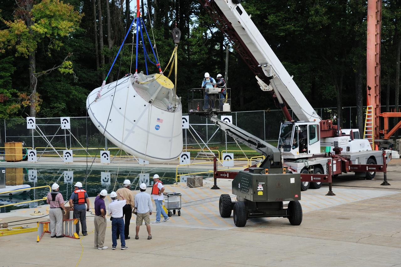 SPLASH BTA Phase 2 Vertical Tests 9: Documentation of preparation, set up and results of full scale BTA (Boilerplate Test Article) vertical drop test series performed in 2012 at the LaRC Hydro Impact Basin (HIB)