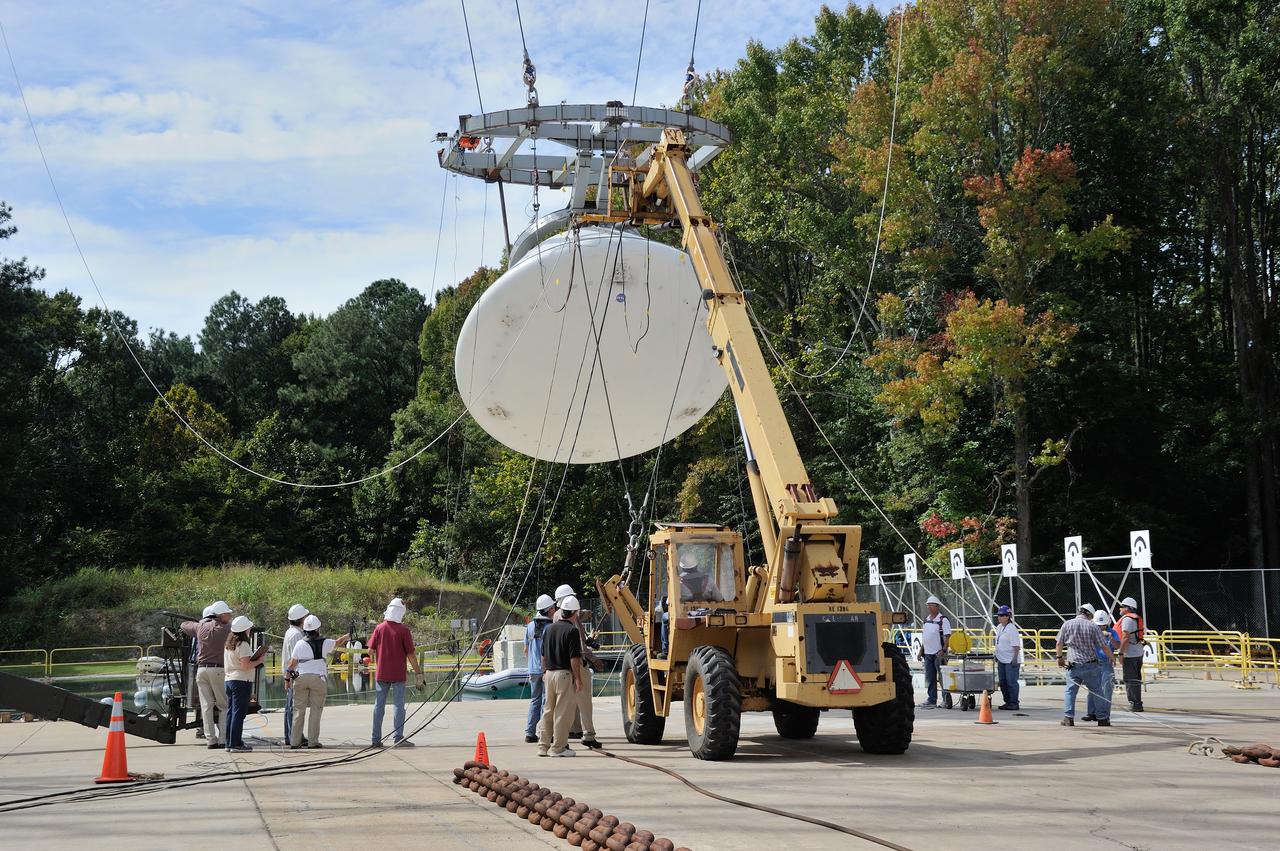 SPLASH P1 Test 7 Swing Test: Documentation of preparation, set up and results of full scale BTA (Boilerplate Test Article) vertical drop test series performed in 2012 at the LaRC Hydro Impact Basin (HIB)  