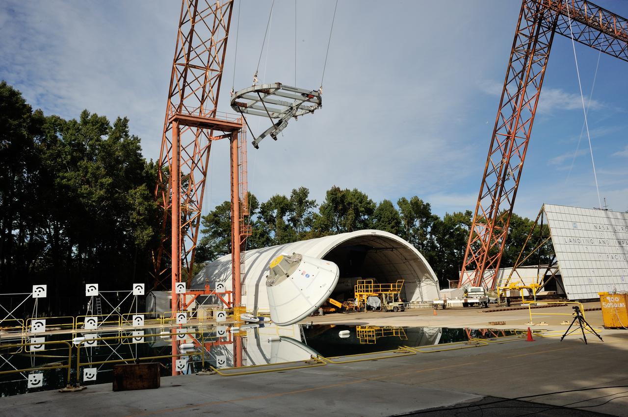 SPLASH P1 Test 7 Swing Test: Documentation of preparation, set up and results of full scale BTA (Boilerplate Test Article) vertical drop test series performed in 2012 at the LaRC Hydro Impact Basin (HIB)  