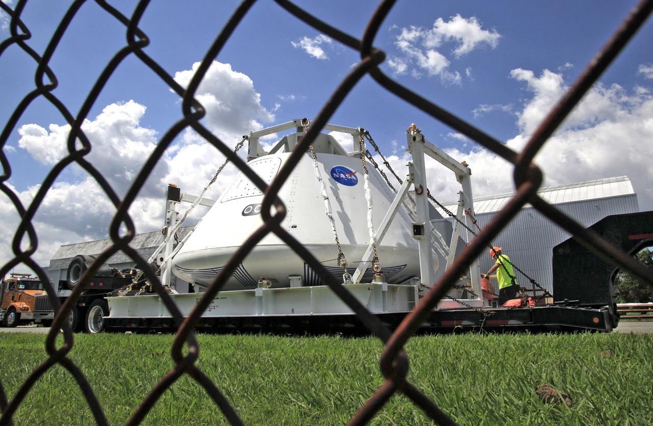 Orion Test Capsule loaded on a flatbed trailer at NASA Langley to be transport to Fort Eustis, VA. where it will be transported by barge to Norfolk Va. for open water recovery test.