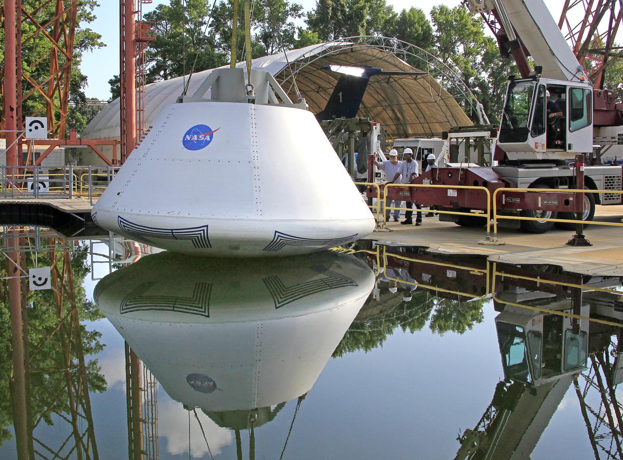 The Orion Test Capsule spent 4 hour in the water tank under NASA Langley's gantry to prove it is ready for the open water recovery test at Norfolk Naval Station. 
