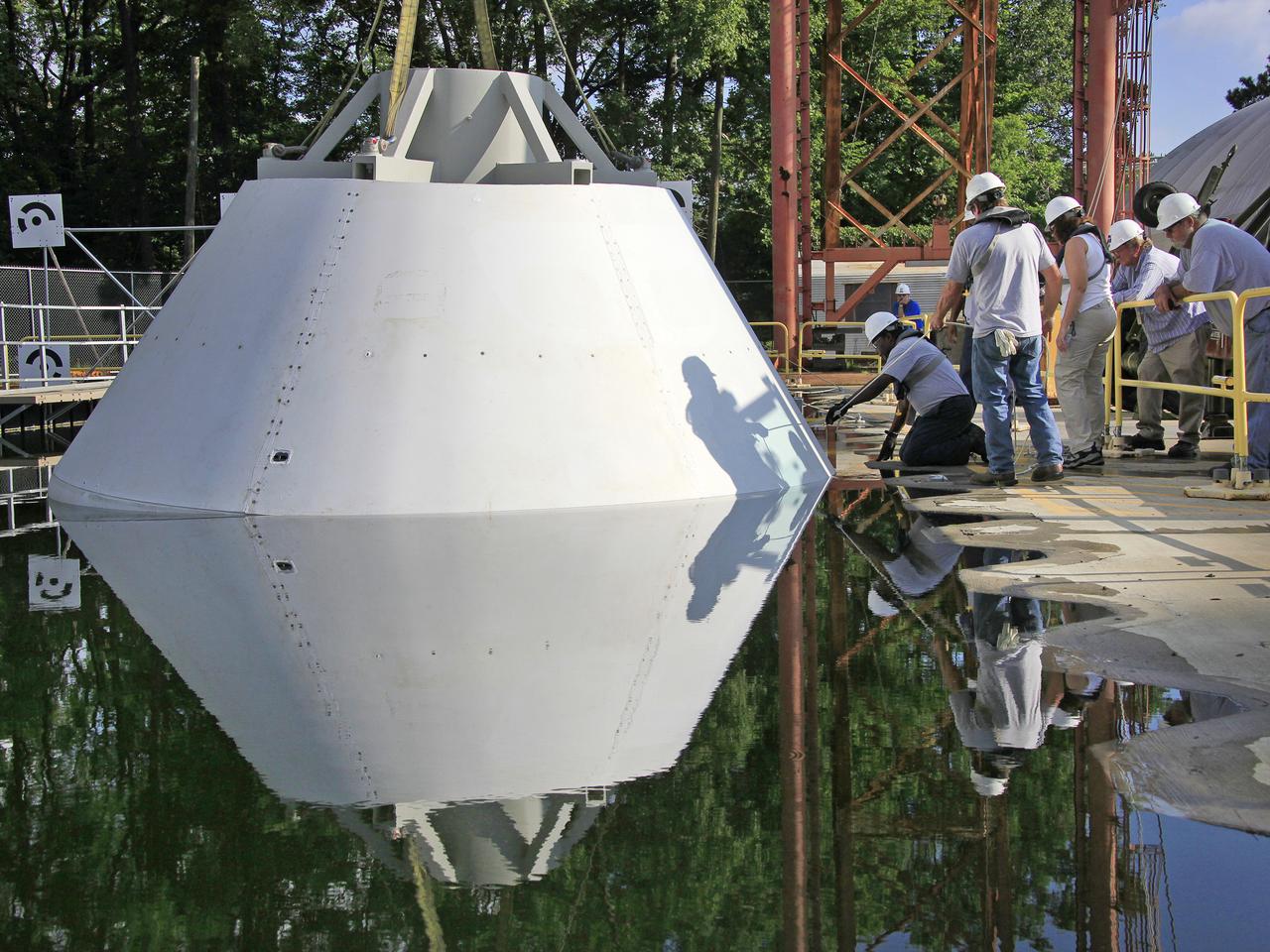 The Orion Test Capsule spent 4 hour in the water tank under NASA Langley's gantry to prove it is ready for the open water recovery test at Norfolk Naval Station. 