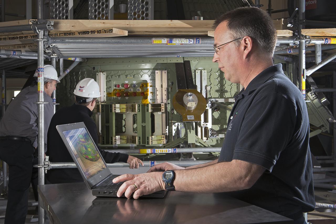 (NESC) NASA Engineering and Safety Center Orion Heat Shield Carrier Structure: Titanium Orthogrid heat shield sub-component  dynamic test article : person in the photo Jim Jeans (Background: Mike Kirsch, James Ainsworth) 