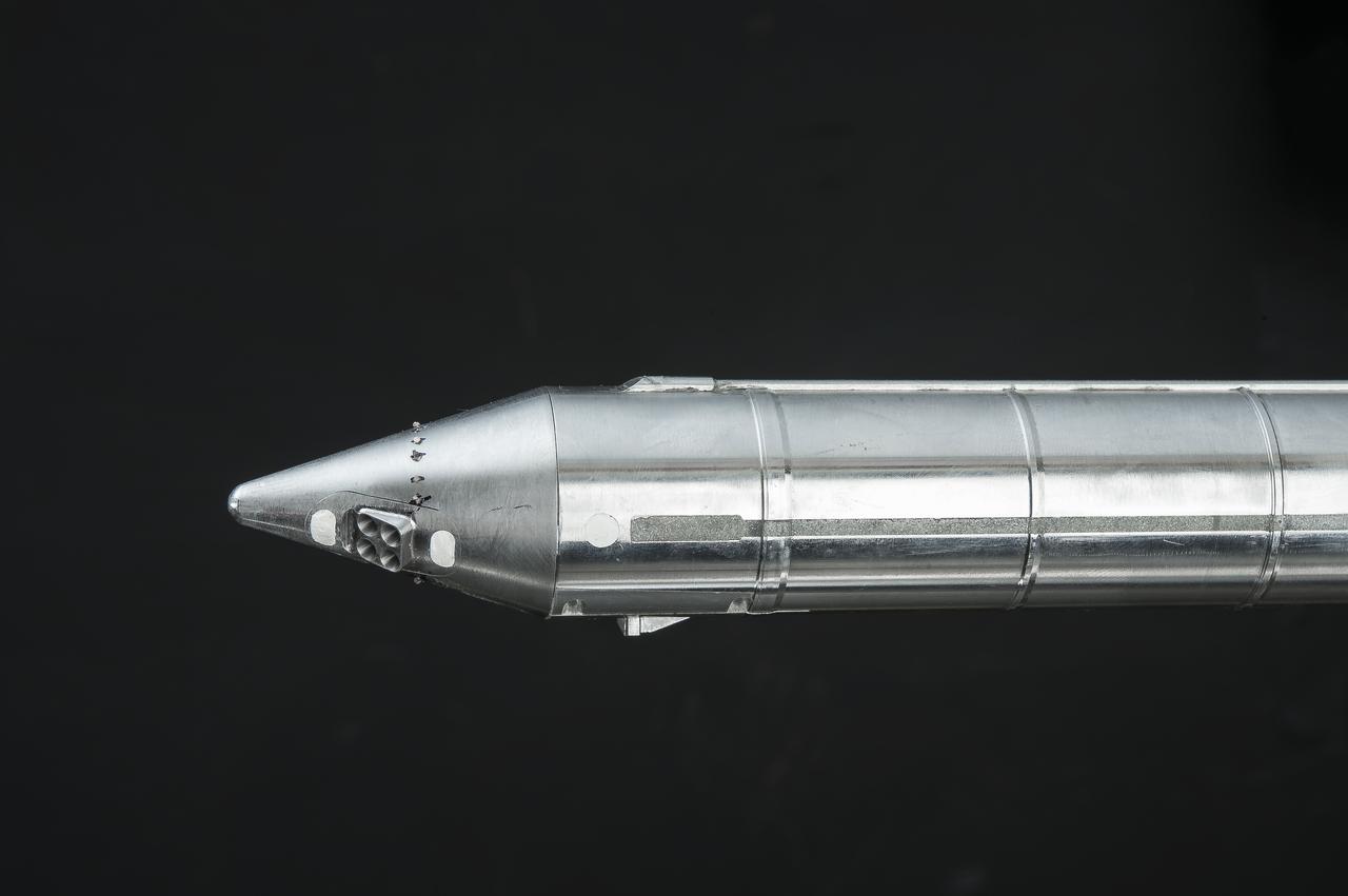 Stage Separation Test of the Space Launch System(SLS) in the Langley Unitary Plan Wind Tunnel (UPWT). The model used High Pressure air blown through the solid rocket boosters. (SRB) to simulate the booster separation motors (BSM) firing.