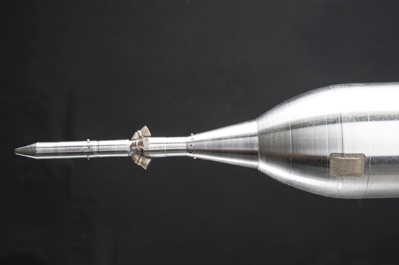 Stage Separation Test of the Space Launch System(SLS) in the Langley Unitary Plan Wind Tunnel (UPWT). The model used High Pressure air blown through the solid rocket boosters. (SRB) to simulate the booster separation motors (BSM) firing.
