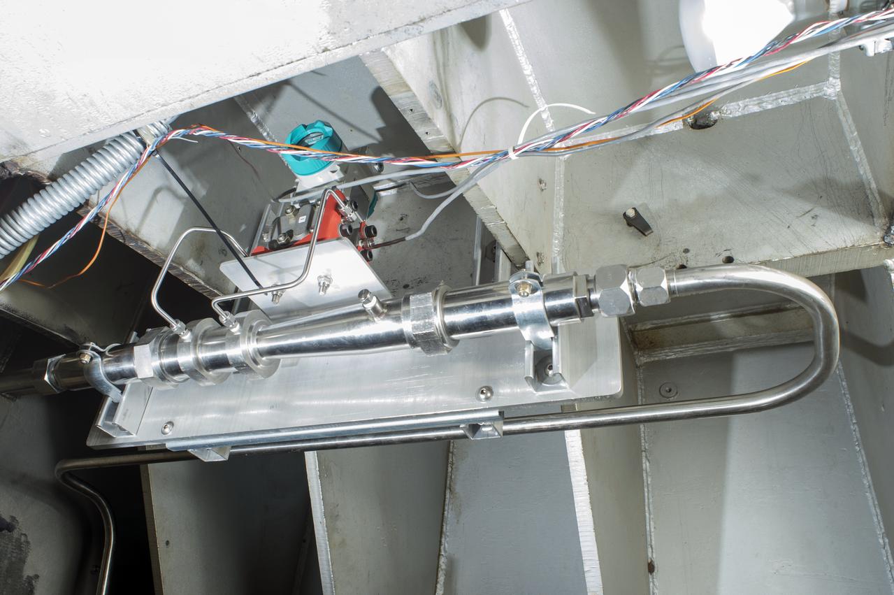 Stage Separation Test of the Space Launch System(SLS) in the Langley Unitary Plan Wind Tunnel (UPWT). The model used High Pressure air blown through the solid rocket boosters. (SRB) to simulate the booster separation motors (BSM) firing.