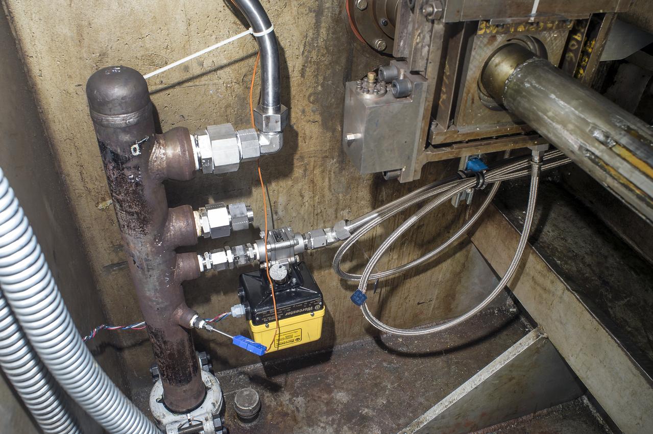 Stage Separation Test of the Space Launch System(SLS) in the Langley Unitary Plan Wind Tunnel (UPWT). The model used High Pressure air blown through the solid rocket boosters. (SRB) to simulate the booster separation motors (BSM) firing.