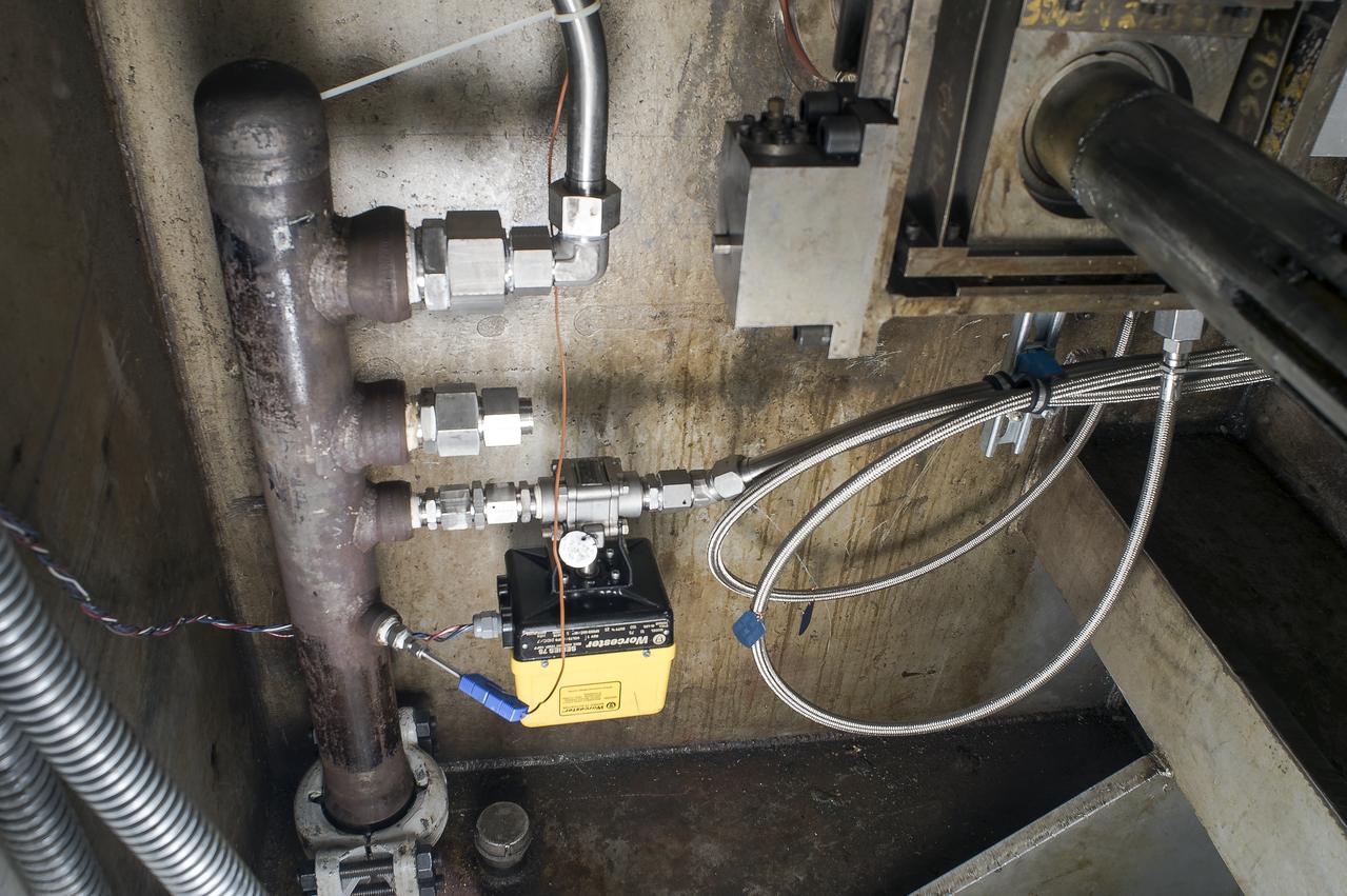 Stage Separation Test of the Space Launch System(SLS) in the Langley Unitary Plan Wind Tunnel (UPWT). The model used High Pressure air blown through the solid rocket boosters. (SRB) to simulate the booster separation motors (BSM) firing.