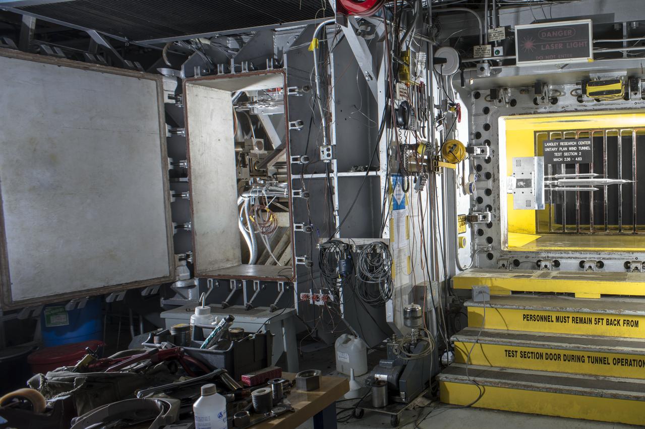 Stage Separation Test of the Space Launch System(SLS) in the Langley Unitary Plan Wind Tunnel (UPWT). The model used High Pressure air blown through the solid rocket boosters. (SRB) to simulate the booster separation motors (BSM) firing.