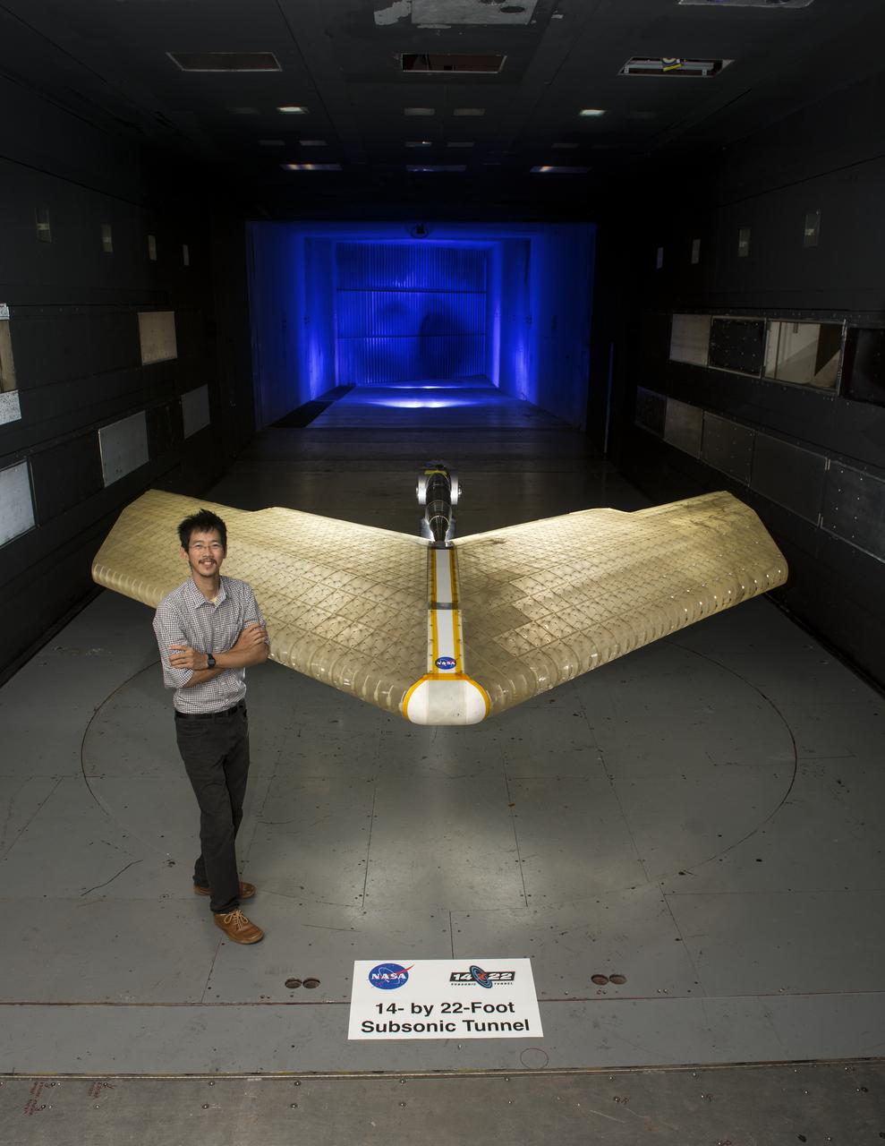 Mission Adaptive Digital Composite Aerostructure Technologies (MADCAT) model in the 14x22 test section, building 1212C, Kenny Cheung from Ames Research Center in photograph. For more information go to NASA.gov article. April 3, 2019 "What is MADCAT?" Flexing Wings for Efficient Flight