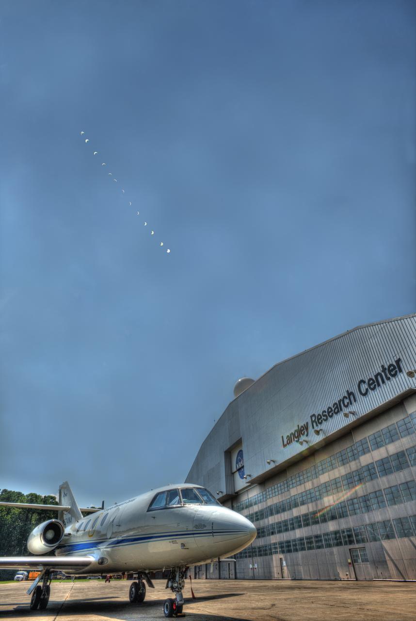 HDR Time lapse composite of the Solar Eclipse with the Falcon UH-25 in front of the NASA Langley hangar. 