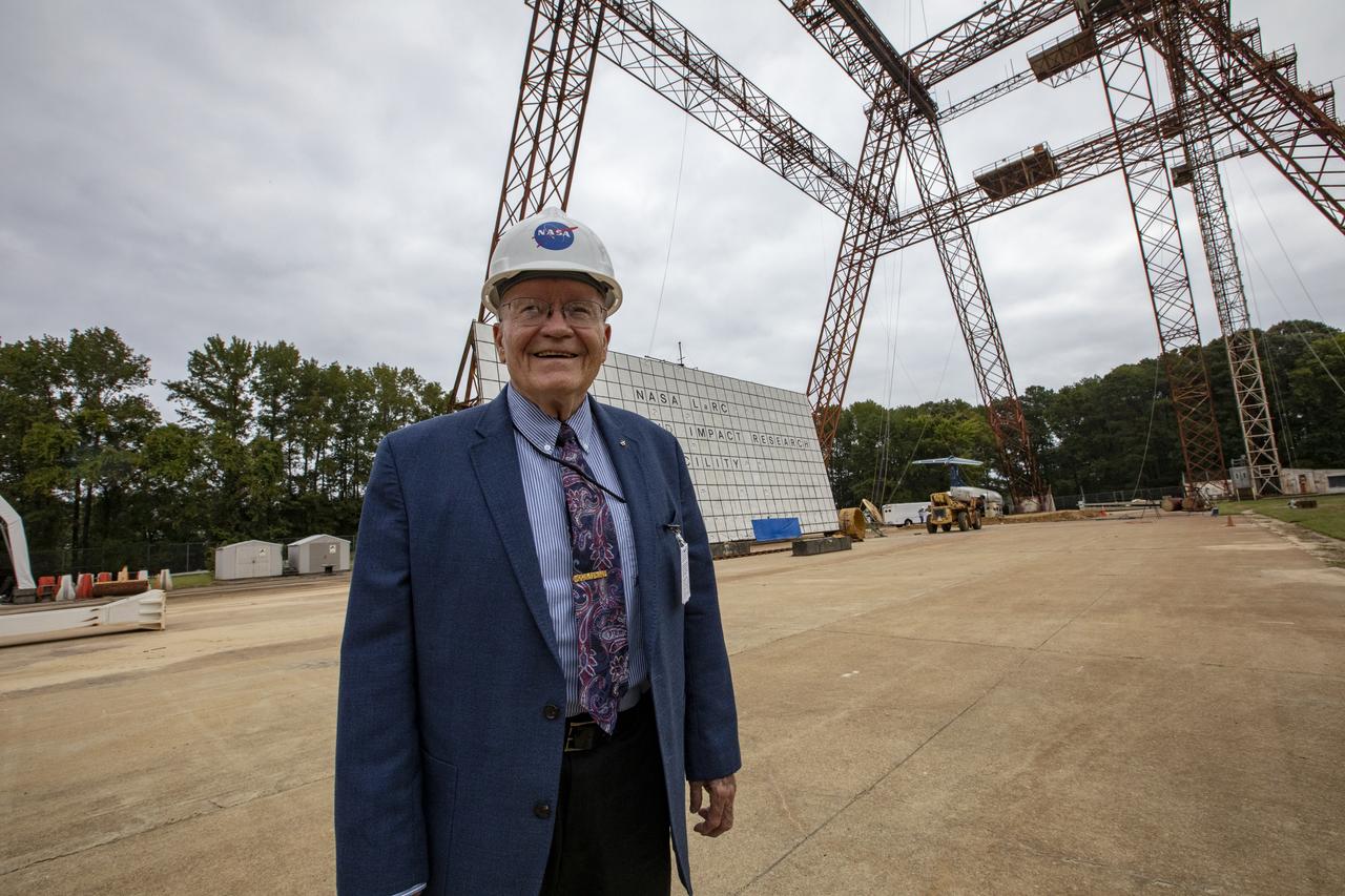 Astronaut Fred Haise visiting the gantry at Langley Research Center; a place where he once trained for the Apollo Mission.