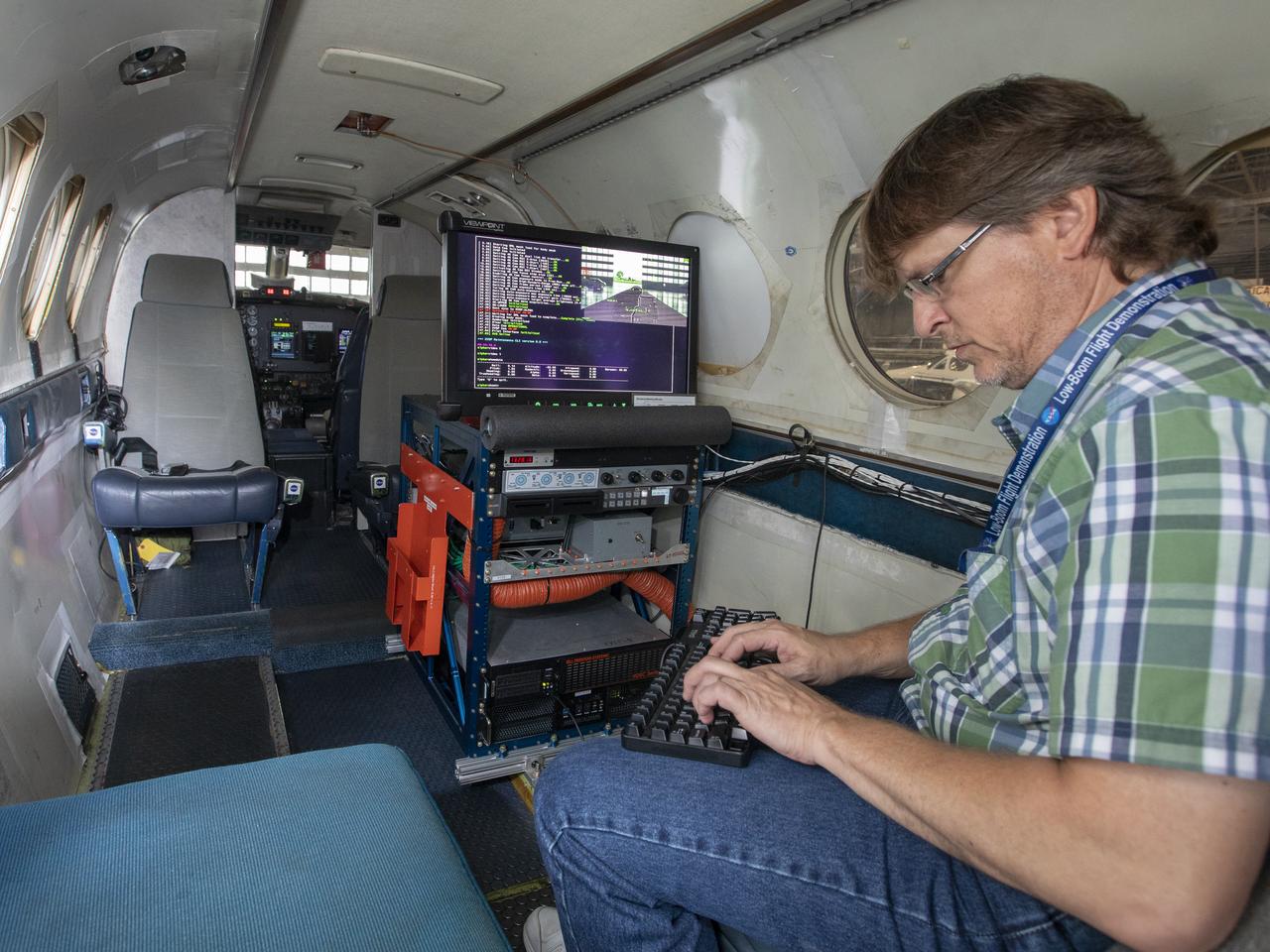 Steve Williams working on the software upgrade for the flight display for the X59.