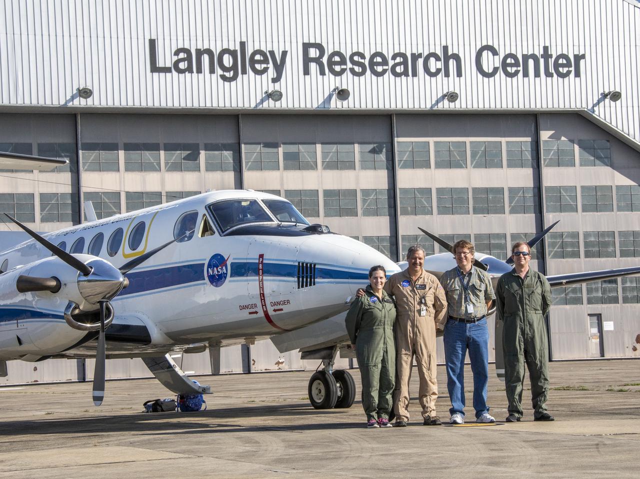 First test flight testing the visual display for the X59. Researchers Lynda Kramer, pilot Kevin Shelton, Steve Williams and ? pose for photo