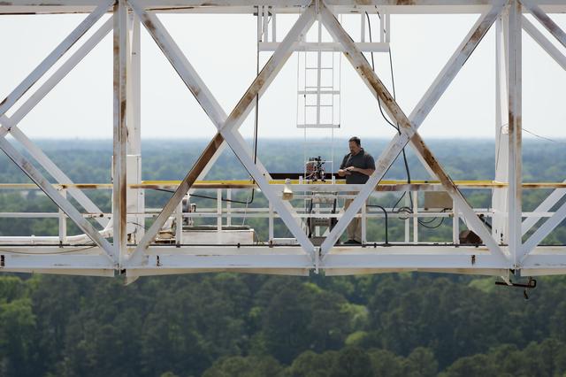 NASA Langley Photographer Halen Capen at the top of the Impact Dynamics Facility NASA Langley. 
