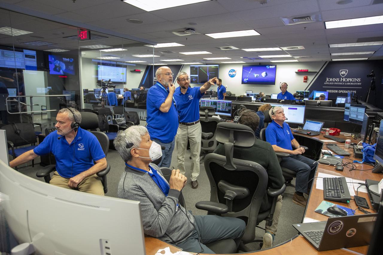 NASA’s Double Asteroid Redirection Test (DART) command team at Johns Hopkins University, Applied Physics Laboratory monitoring the DART spacecraft’s impact into the asteroid Dimorphos. The operation is the first of its kind test to redirect deadly asteroids from hitting Earth.  