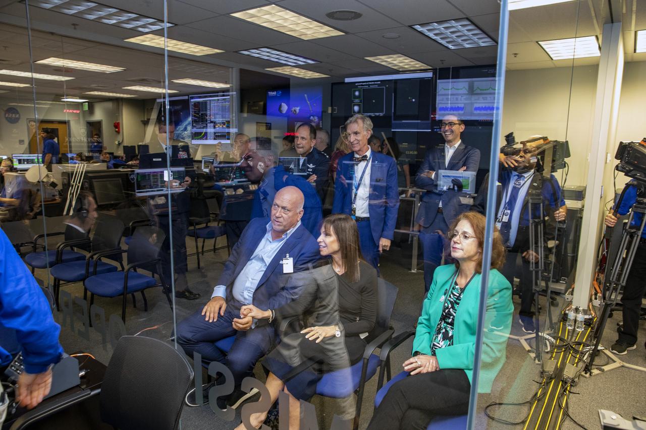 NASA’s Double Asteroid Redirection Test (DART) command team at Johns Hopkins University, Applied Physics Laboratory monitoring the DART spacecraft’s impact into the asteroid Dimorphos. The operation is the first of its kind test to redirect deadly asteroids from hitting Earth.  