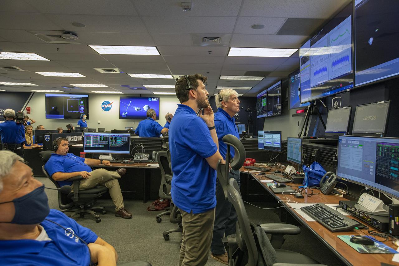 NASA’s Double Asteroid Redirection Test (DART) command team at Johns Hopkins University, Applied Physics Laboratory monitoring the DART spacecraft’s impact into the asteroid Dimorphos. The operation is the first of its kind test to redirect deadly asteroids from hitting Earth.  