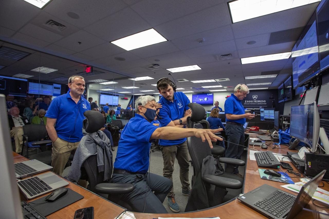 NASA’s Double Asteroid Redirection Test (DART) command team at Johns Hopkins University, Applied Physics Laboratory monitoring the DART spacecraft’s impact into the asteroid Dimorphos. The operation is the first of its kind test to redirect deadly asteroids from hitting Earth.  