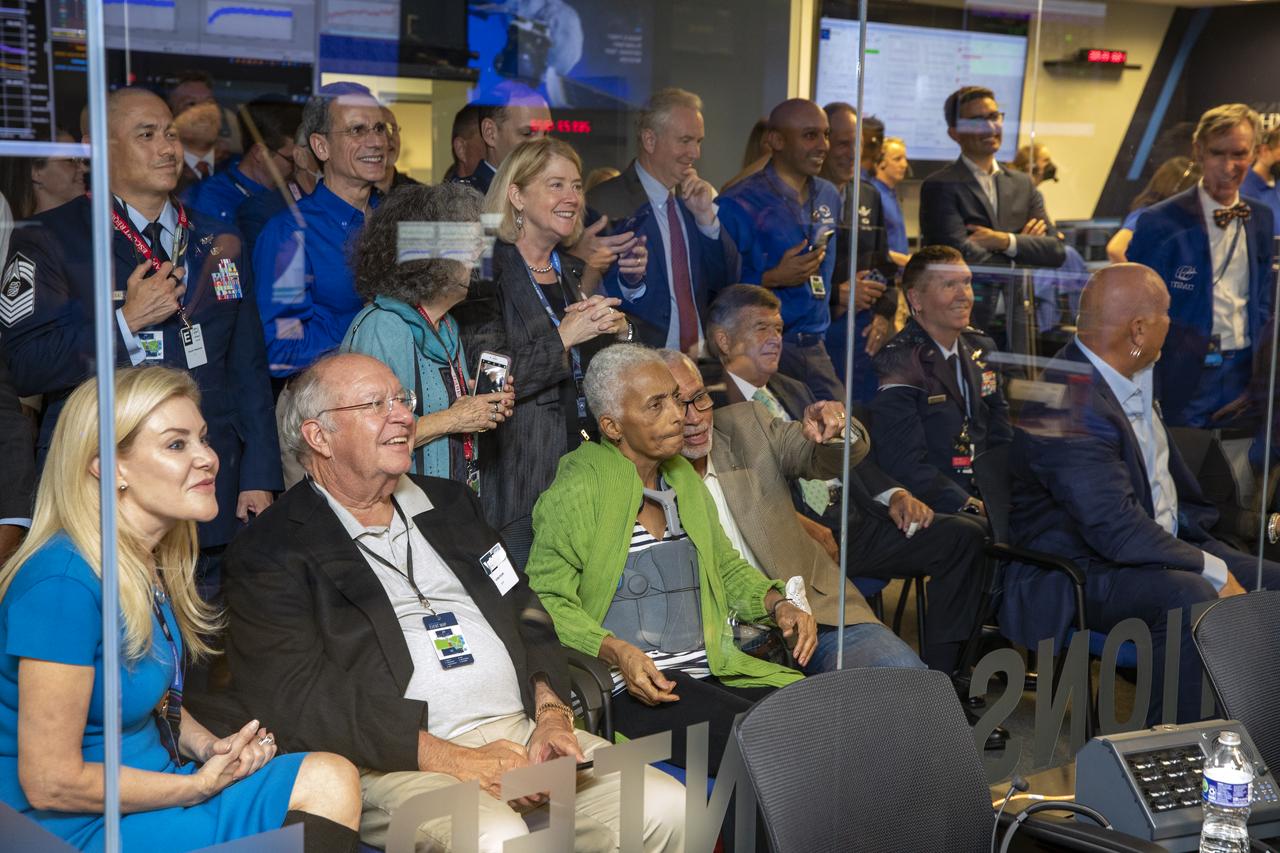 NASA’s Double Asteroid Redirection Test (DART) command team at Johns Hopkins University, Applied Physics Laboratory monitoring the DART spacecraft’s impact into the asteroid Dimorphos. The operation is the first of its kind test to redirect deadly asteroids from hitting Earth.  