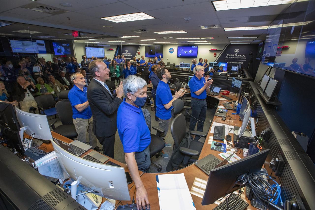 NASA’s Double Asteroid Redirection Test (DART) command team at Johns Hopkins University, Applied Physics Laboratory monitoring the DART spacecraft’s impact into the asteroid Dimorphos. The operation is the first of its kind test to redirect deadly asteroids from hitting Earth.  