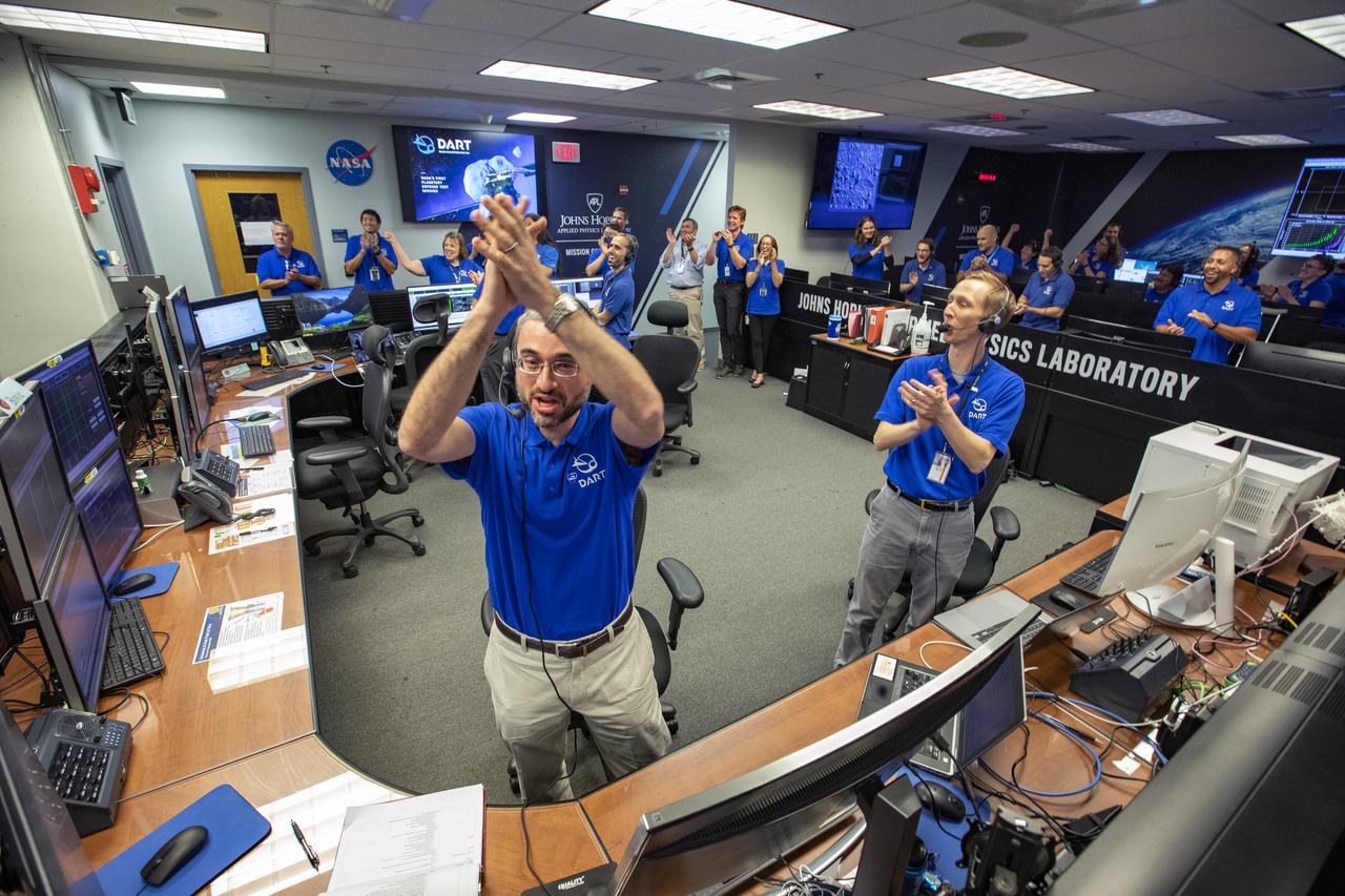 NASA’s Double Asteroid Redirection Test (DART) command team at Johns Hopkins University, Applied Physics Laboratory monitoring the DART spacecraft’s impact into the asteroid Dimorphos. The operation is the first of its kind test to redirect deadly asteroids from hitting Earth.  