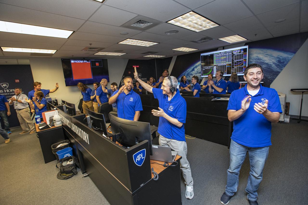 NASA’s Double Asteroid Redirection Test (DART) command team at Johns Hopkins University, Applied Physics Laboratory monitoring the DART spacecraft’s impact into the asteroid Dimorphos. The operation is the first of its kind test to redirect deadly asteroids from hitting Earth.  