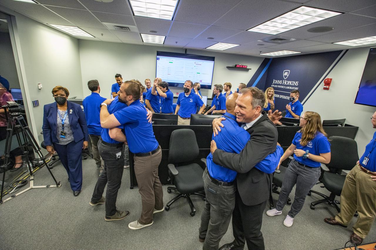 NASA’s Double Asteroid Redirection Test (DART) command team at Johns Hopkins University, Applied Physics Laboratory monitoring the DART spacecraft’s impact into the asteroid Dimorphos. The operation is the first of its kind test to redirect deadly asteroids from hitting Earth.  