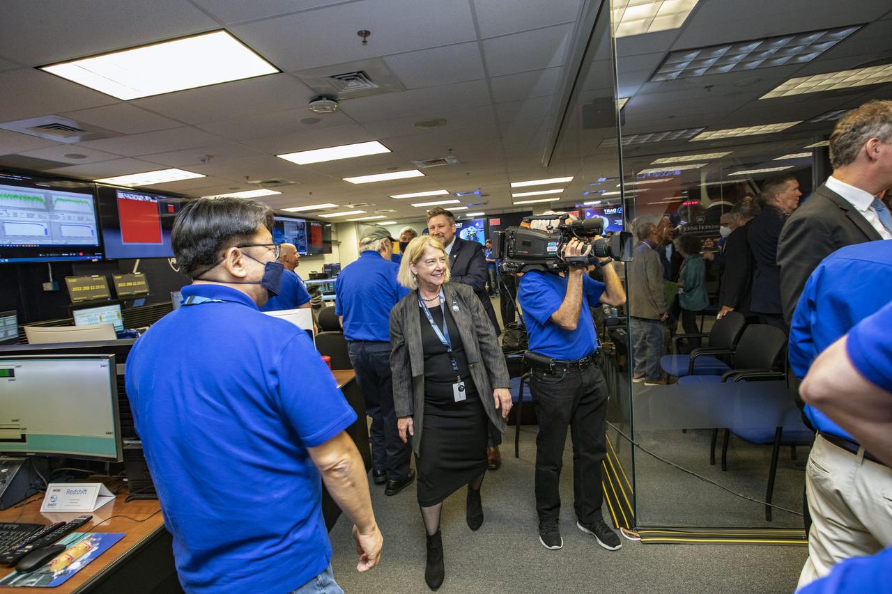 NASA’s Double Asteroid Redirection Test (DART) command team at Johns Hopkins University, Applied Physics Laboratory monitoring the DART spacecraft’s impact into the asteroid Dimorphos. The operation is the first of its kind test to redirect deadly asteroids from hitting Earth.  