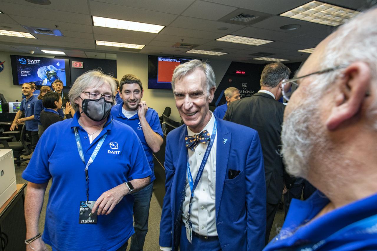 NASA’s Double Asteroid Redirection Test (DART) command team at Johns Hopkins University, Applied Physics Laboratory monitoring the DART spacecraft’s impact into the asteroid Dimorphos. The operation is the first of its kind test to redirect deadly asteroids from hitting Earth.  