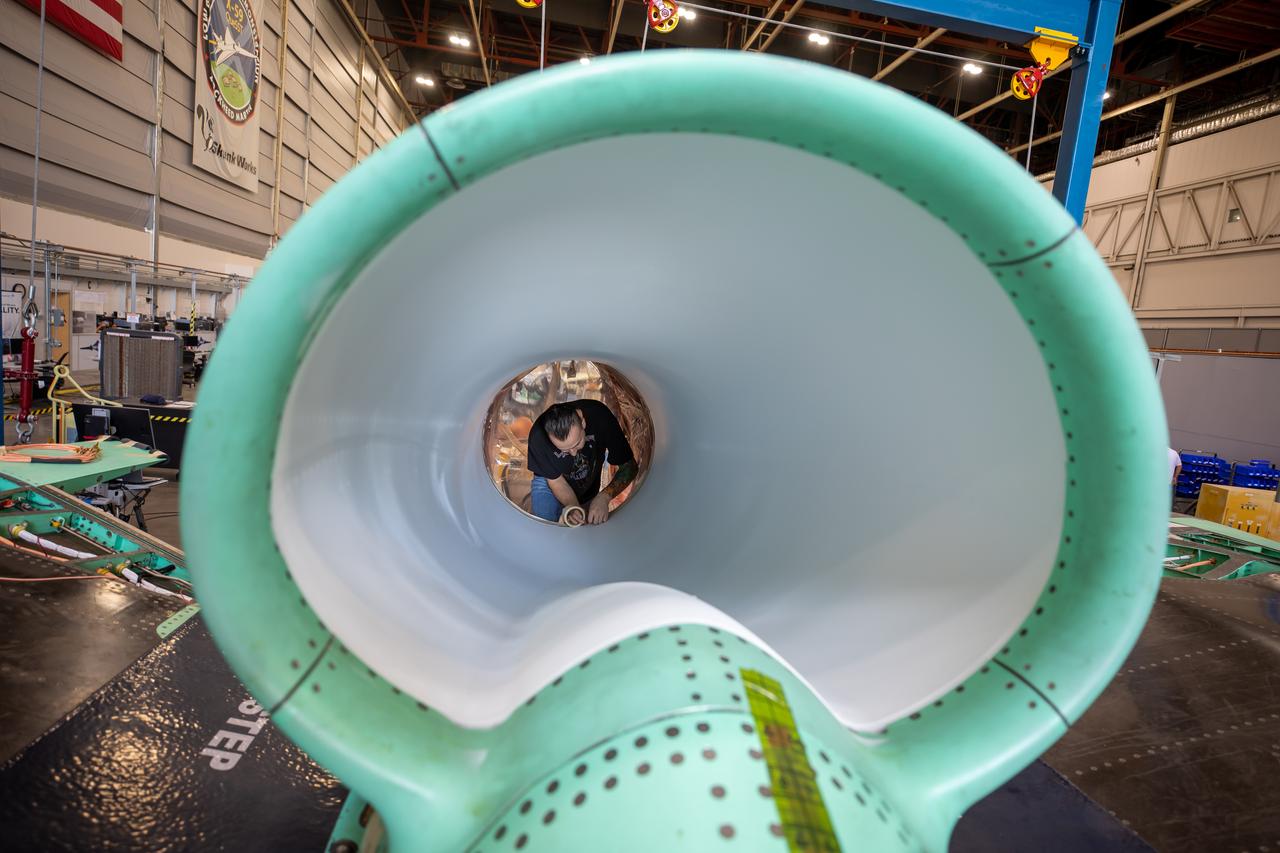 This is an up-close view of the X-59’s engine inlet  –  fresh after being painted. The 13-foot F414-GE-100 engine will be placed inside the inlet bringing the X-59 aircraft one step closer to completion. Once fully assembled, the X-59 aircraft will begin flight operations, working toward demonstration of the ability to fly supersonic while reducing the loud sonic boom to a quiet sonic thump, helping to enable commercial supersonic air travel over land.