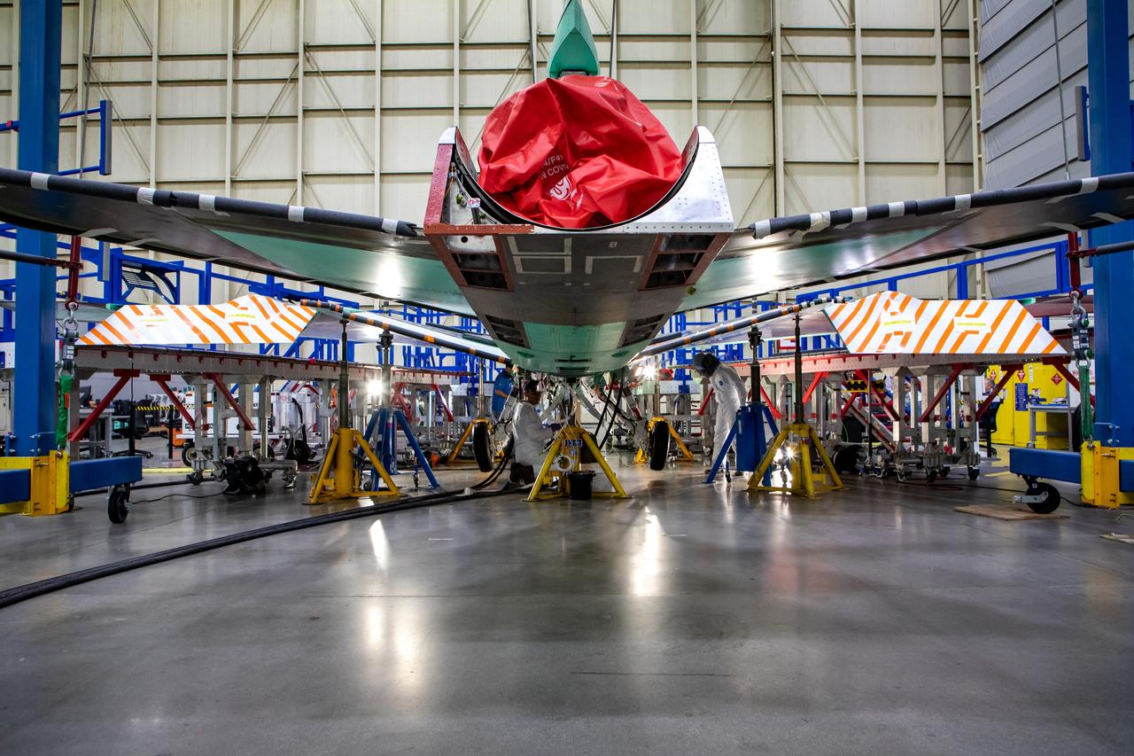 Technicians perform landing gear checkout testing at Lockheed Martin Skunk Works in Palmdale, California. These tests make sure that all the parts of X-59’s landing gear and doors are working in the correct order.  The X-59 is the centerpiece of NASA’s Quesst mission, which could help enable commercial supersonic air travel over land. 