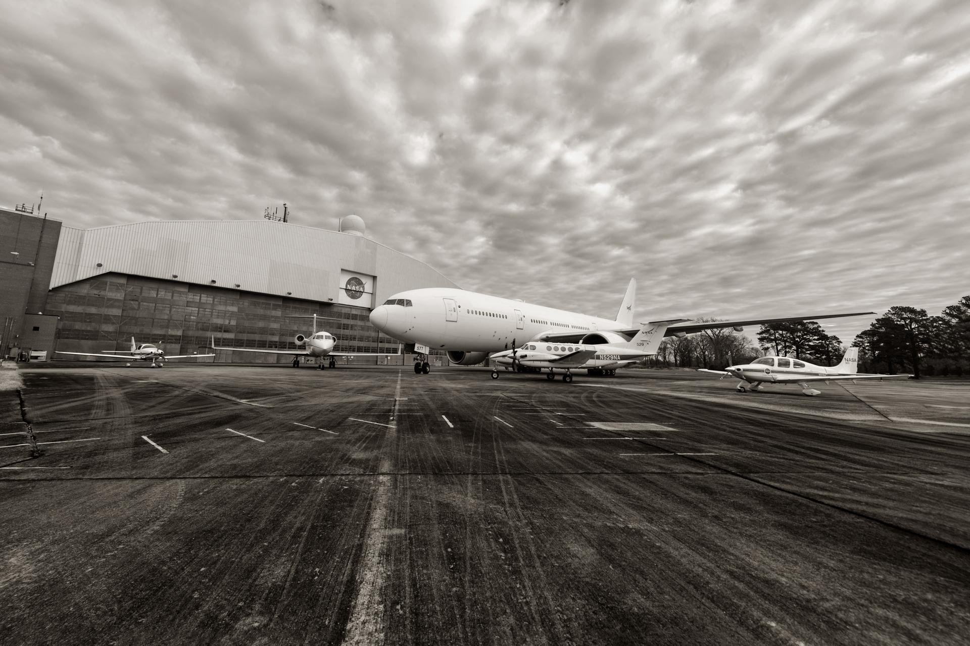 NASA Langley Research Science Directorate (RSD) Aircraft outside the hangar in Hampton Va in black white.