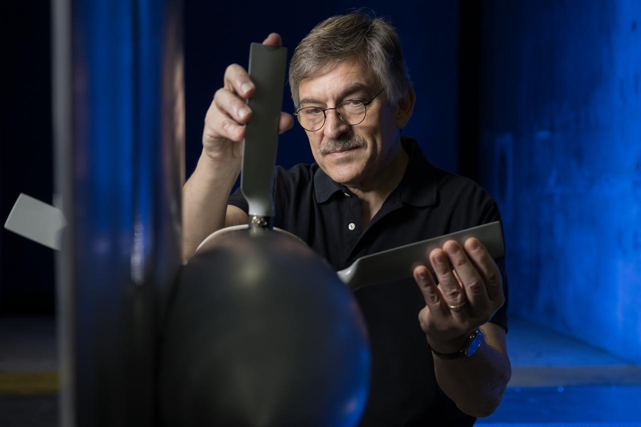 NASA researcher Norman W. Schaeffler adjusts a propellor, which is part of a 7-foot wing model that was recently tested at NASA’s Langley Research Center in Hampton, Virginia. In May and June, NASA researchers tested the wing in the 14-by-22-Foot Subsonic Wind Tunnel to collect data on critical propeller-wing interactions. The lessons learned from this testing will be shared with the public to support advanced air mobility aircraft development.