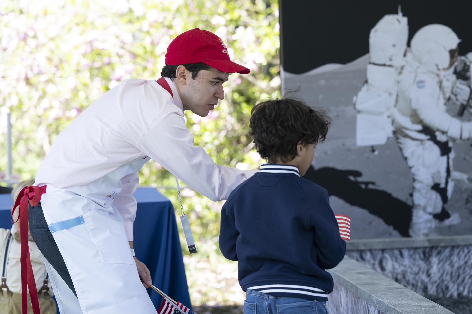 Child explores the NASA Moon Box (Lunar Sandbox) digging for “moon rocks” and planting an American flag, to bringing Artemis exploration to life through curiosity and engagement. during the White House Easter Egg Roll, on the South Lawn in Washington D.C., on April 6, 2026. (Photo Credit: (NASA/Crystal R. Hines).