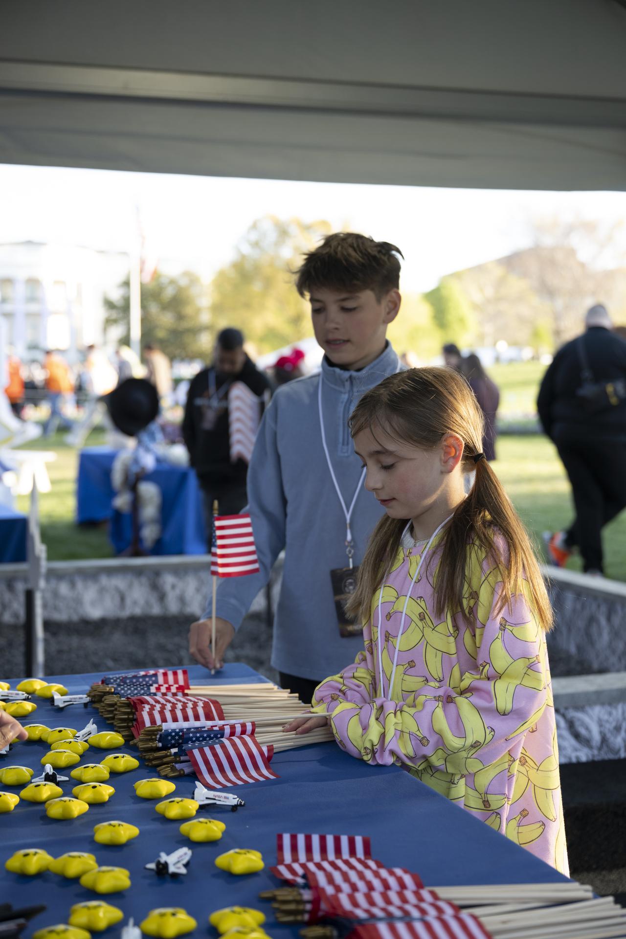 Children explore the NASA Moon Box (Lunar Sandbox) digging for “moon rocks” and planting an American flag, to bringing Artemis exploration to life through curiosity and engagement. during the White House Easter Egg Roll, on the South Lawn in Washington D.C., on April 6, 2026. (Photo Credit: (NASA/Crystal R. Hines)