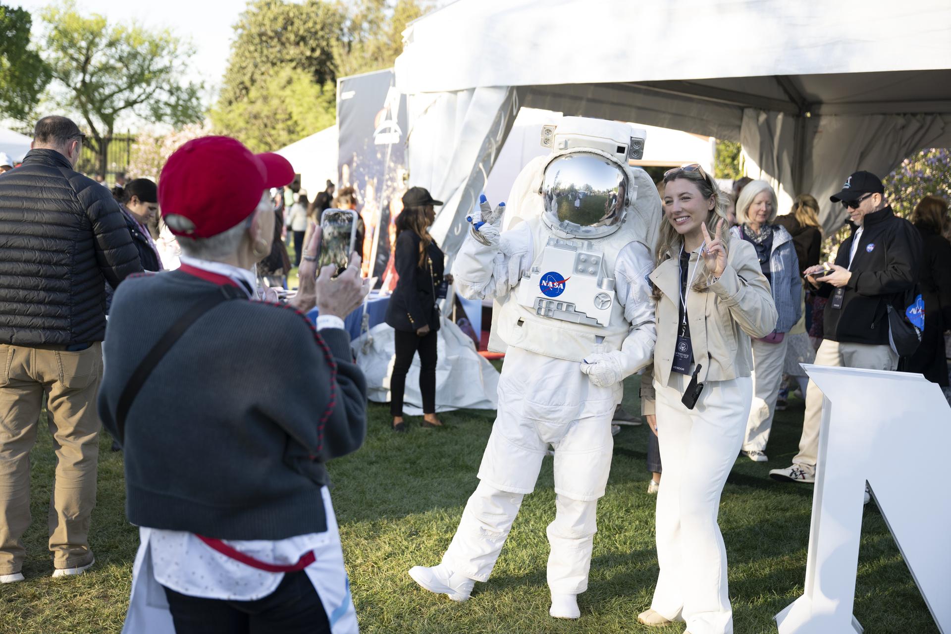 Spacey Casey poses for photos with guests on the South Lawn in Washington D.C., on April 6, 2026. Photo Credit: (NASA/Crystal R. Hines)