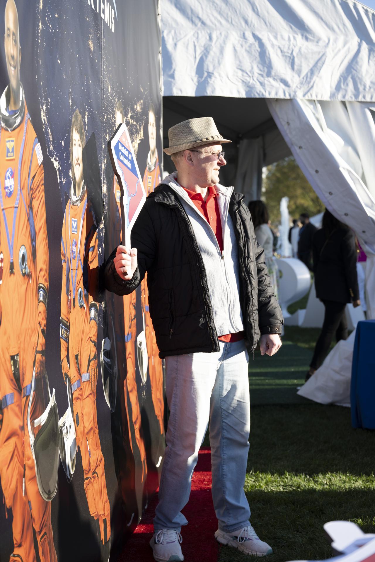 Guests pose in the NASA Artemis Photo Booth at the White House Easter Egg Roll, on the South Lawn in Washington D.C., on April 6, 2026. (Photo Credit: (NASA/Crystal R. Hines)
