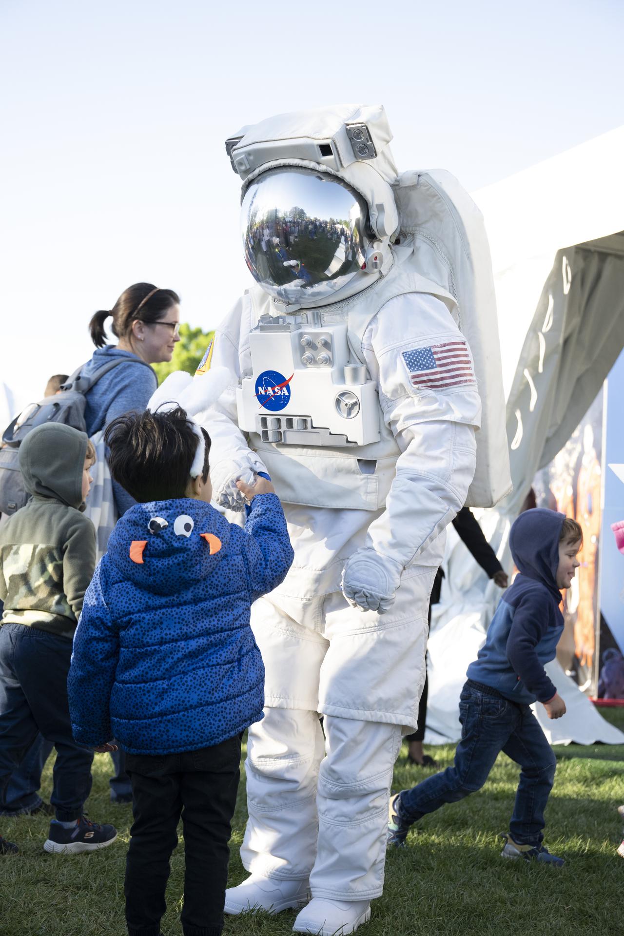 Spacey Casey interacts with guests during the White House Easter Egg Roll, on the South Lawn in Washington D.C., on April 6, 2026. (Photo Credit: (NASA/Crystal R. Hines)