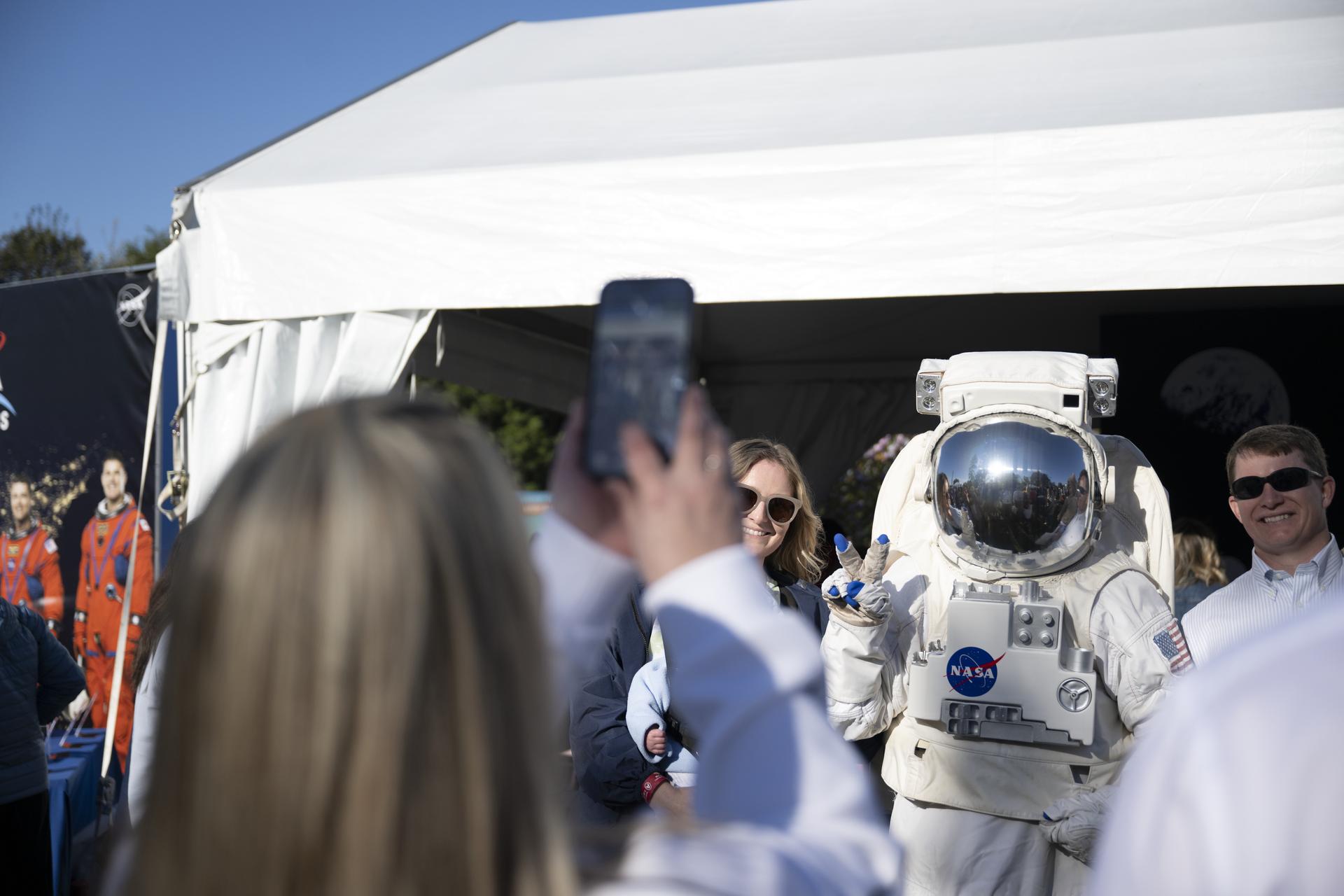 Spacey Casey poses for photos with guests on the South Lawn in Washington D.C., on April 6, 2026. Photo Credit: (NASA/Crystal R. Hines)