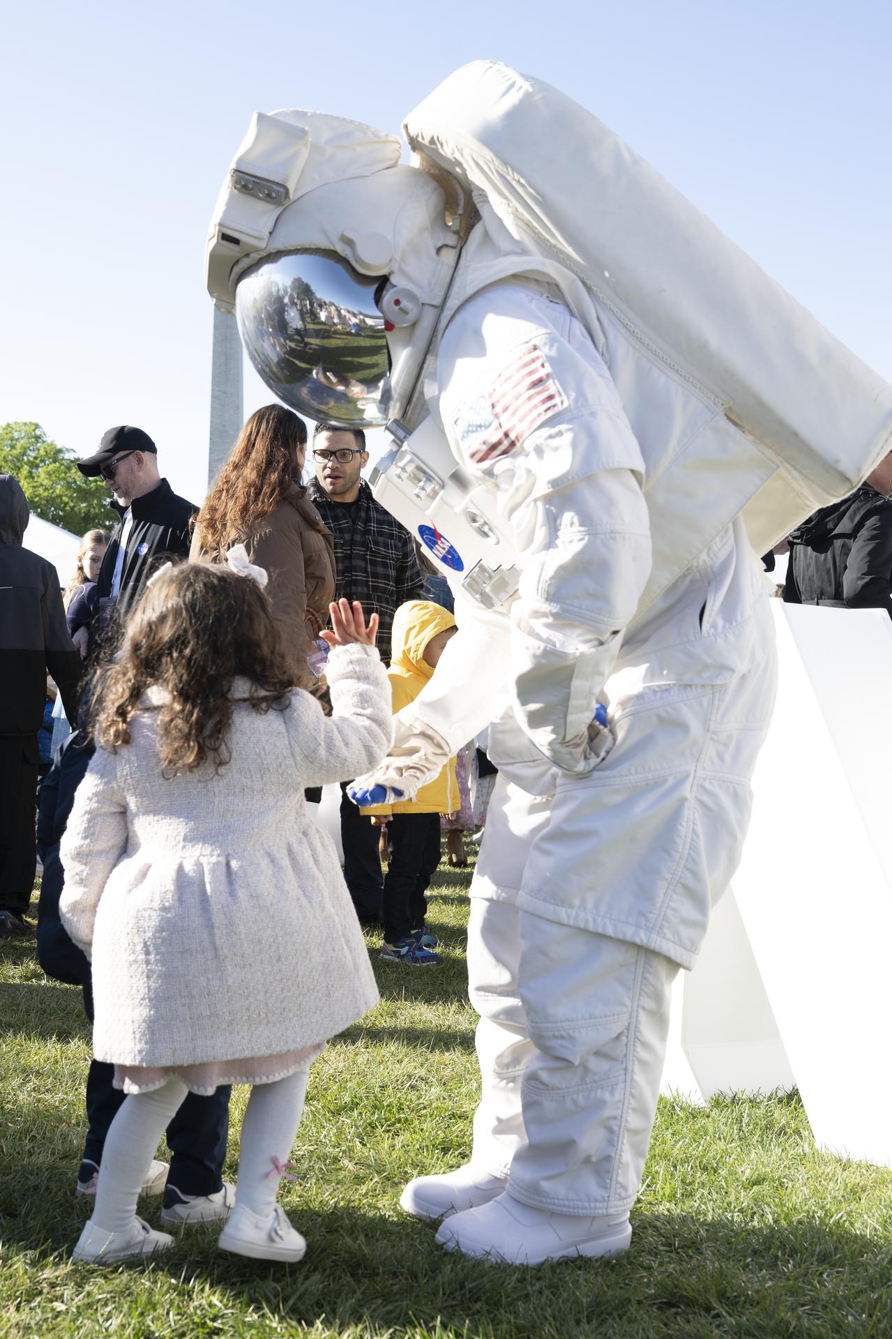 Spacey Casey interacts with guests during the White House Easter Egg Roll, on the South Lawn in Washington D.C., on April 6, 2026. (Photo Credit: (NASA/Crystal R. Hines)