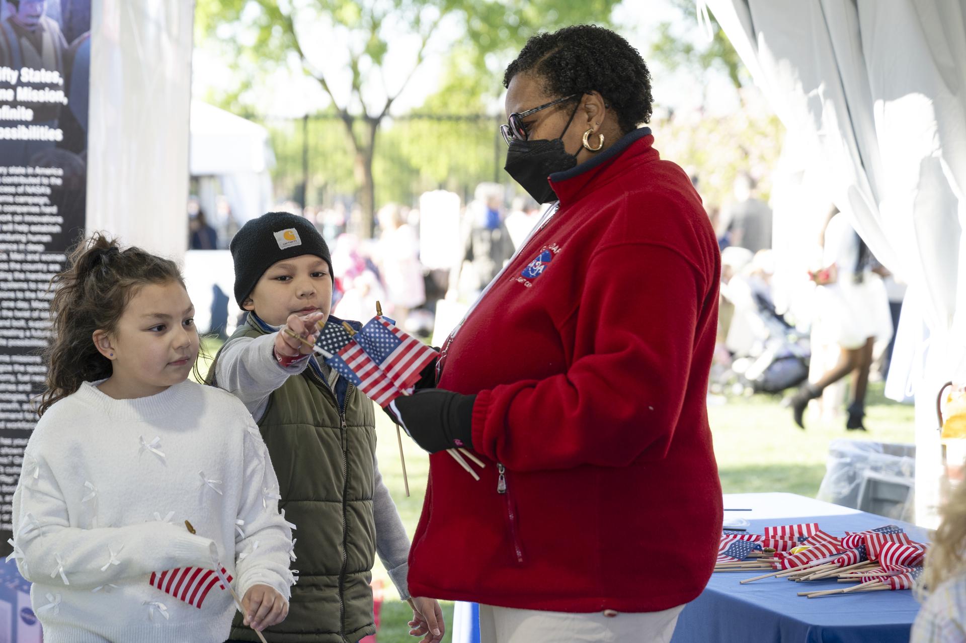 Guests engage in STEM Stations at the White House Easter Egg Roll, on the South Lawn in Washington D.C., on April 6, 2026. Photo Credit: (NASA/Crystal R. Hines)