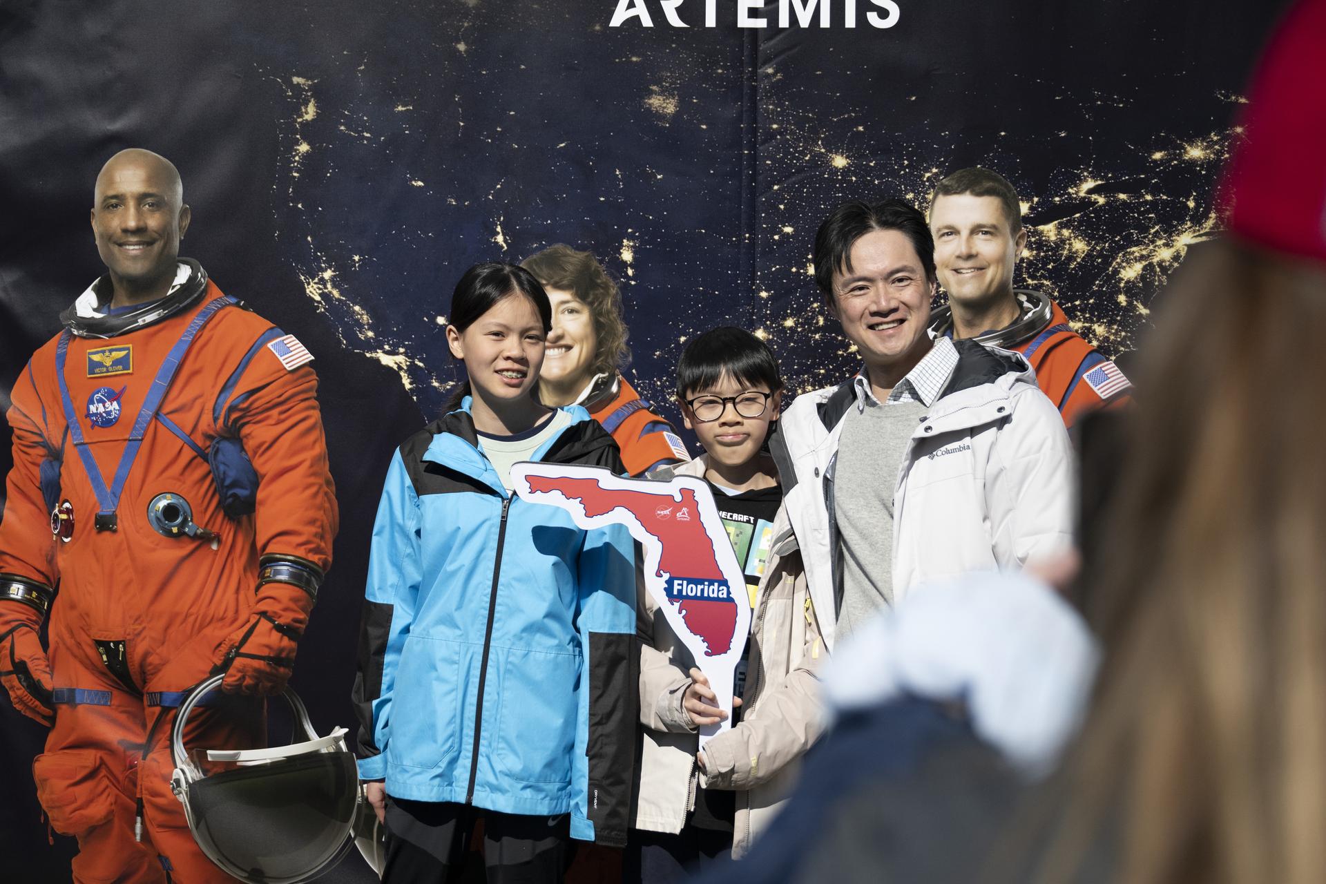 Guests pose in the NASA Artemis Photo Booth at the White House Easter Egg Roll, on the South Lawn in Washington D.C., on April 6, 2026. (Photo Credit: (NASA/Crystal R. Hines)