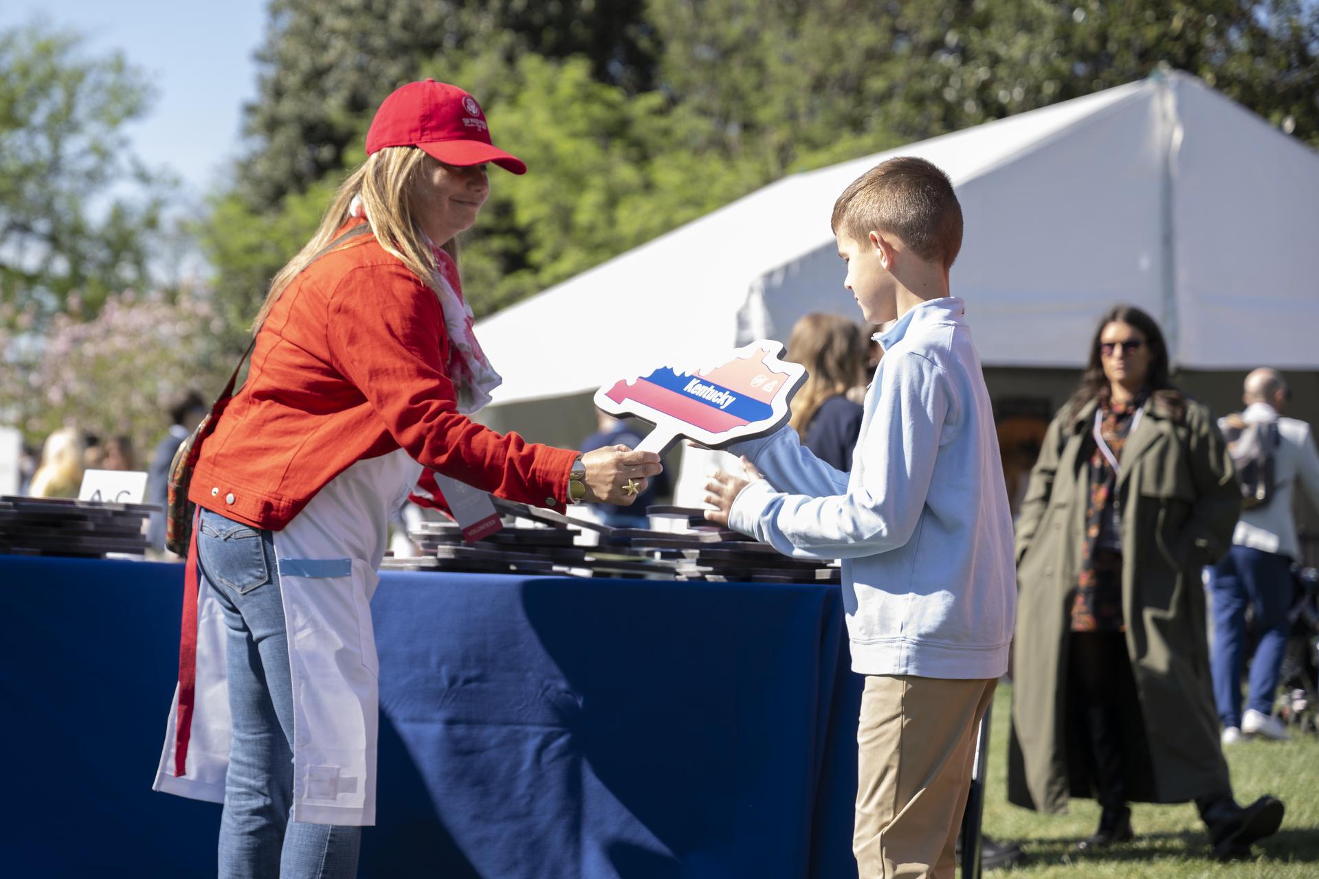 Guests engage in STEM Stations at the White House Easter Egg Roll, on the South Lawn in Washington D.C., on April 6, 2026. Photo Credit: (NASA/Crystal R. Hines)