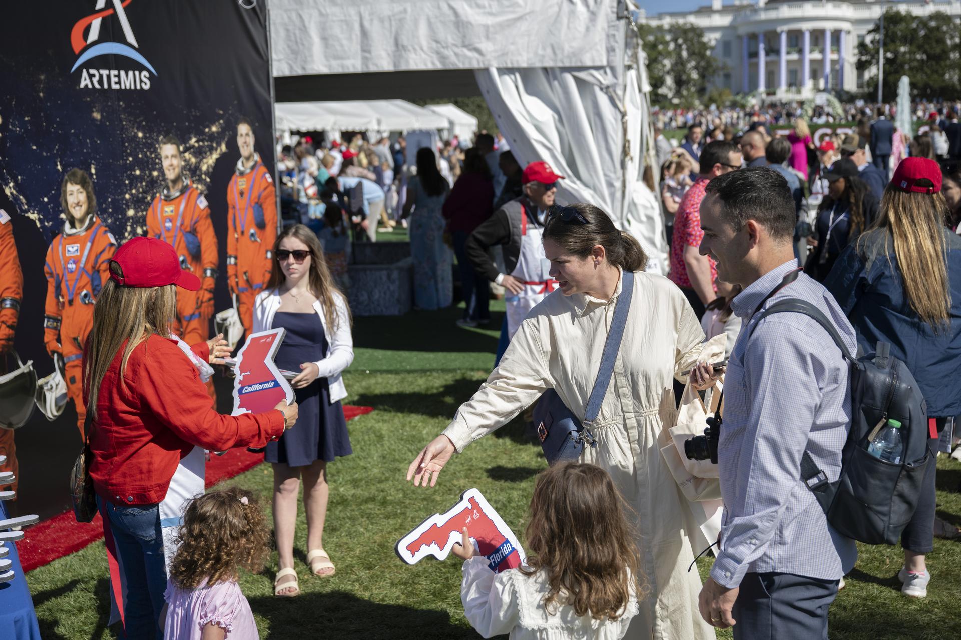 Guests engage in STEM Stations at the White House Easter Egg Roll, on the South Lawn in Washington D.C., on April 6, 2026. Photo Credit: (NASA/Crystal R. Hines)
