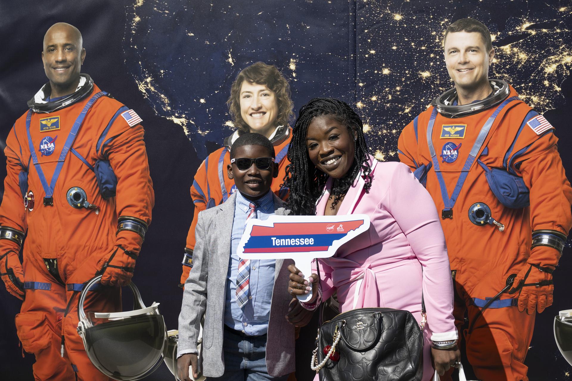 Guests pose in the NASA Artemis Photo Booth at the White House Easter Egg Roll, on the South Lawn in Washington D.C., on April 6, 2026. (Photo Credit: (NASA/Crystal R. Hines)